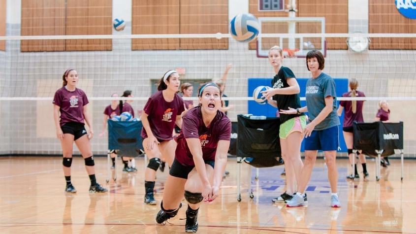 Vollyball Team Practicing in Webster Gym